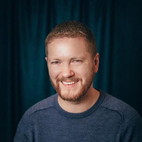 A headshot that I had taken at work several years ago